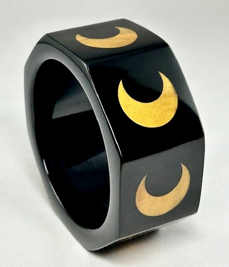 WT13 black octagon resin bangle with pearly gold crescent moons